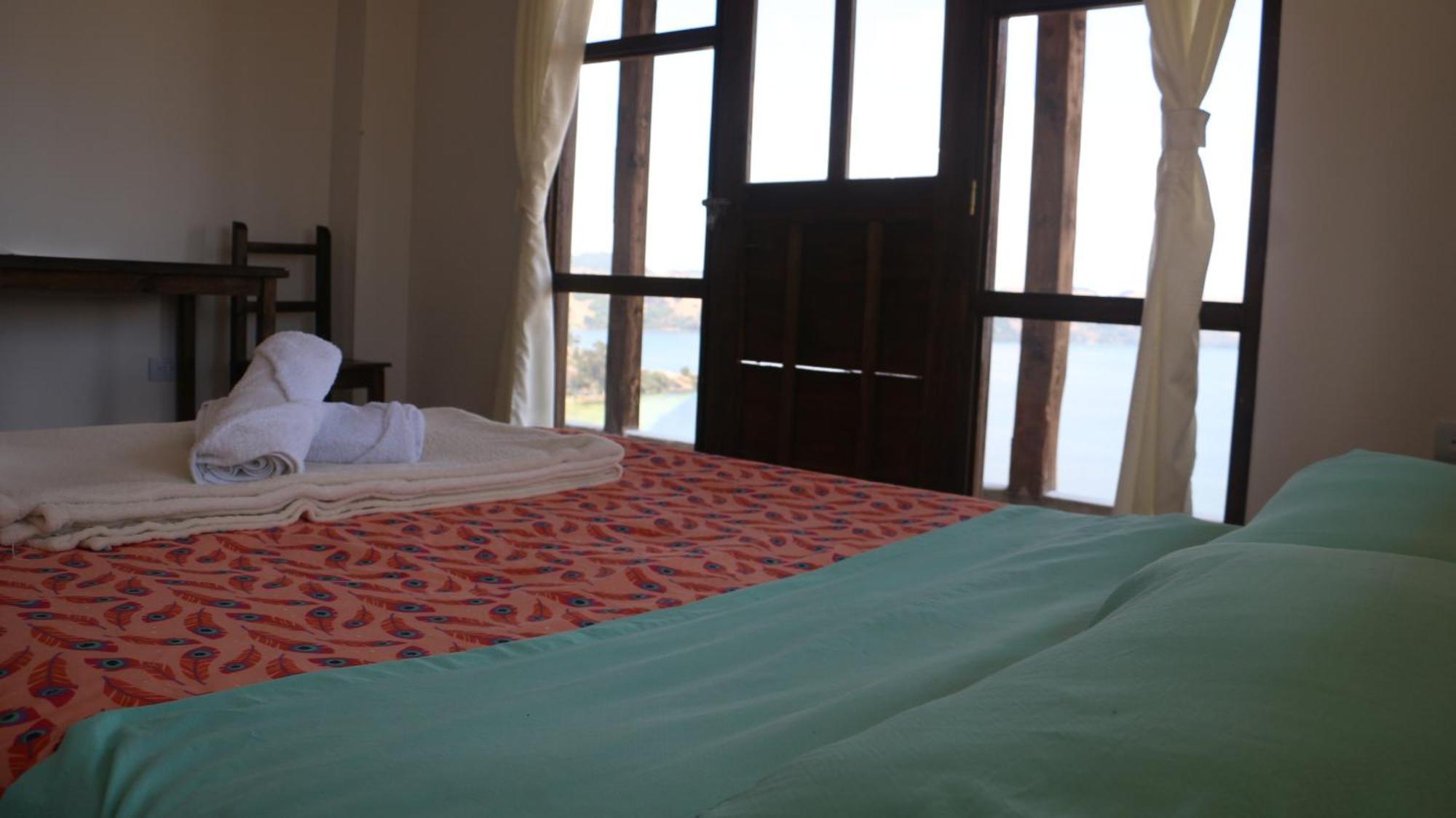 Hotel Tota Eliseo Playa Blanca Lago De טוטה מראה חיצוני תמונה