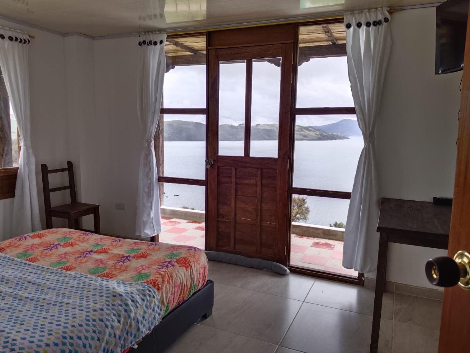 Hotel Tota Eliseo Playa Blanca Lago De טוטה מראה חיצוני תמונה